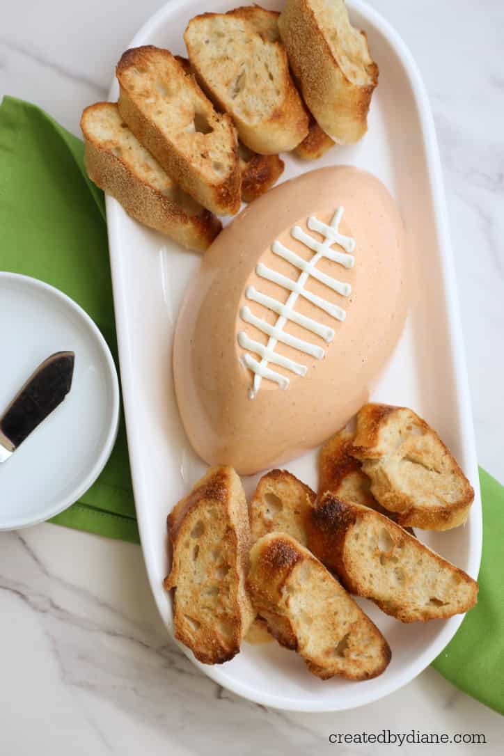 football shaped dip recipe, make in a plastic football shape dish, served with toasted baguette createdbydiane.com